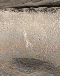 This picture is a colorized view of the light-toned gully deposit, draped over a topographic image derived from Mars Global Surveyor's Mars Orbiter Laser Altimeter data.