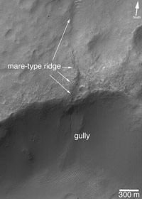 The second picture shows a gully that formed on the wall of a crater that intersected a mare-type ridge.