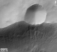 The third picture shows a small crater on the rim of a larger crater.